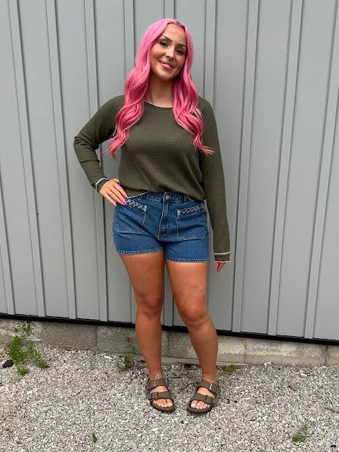 green long sleeve stitch top