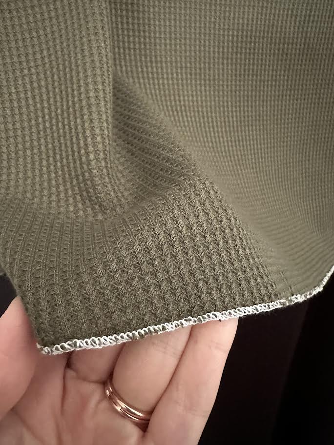 green long sleeve stitch top