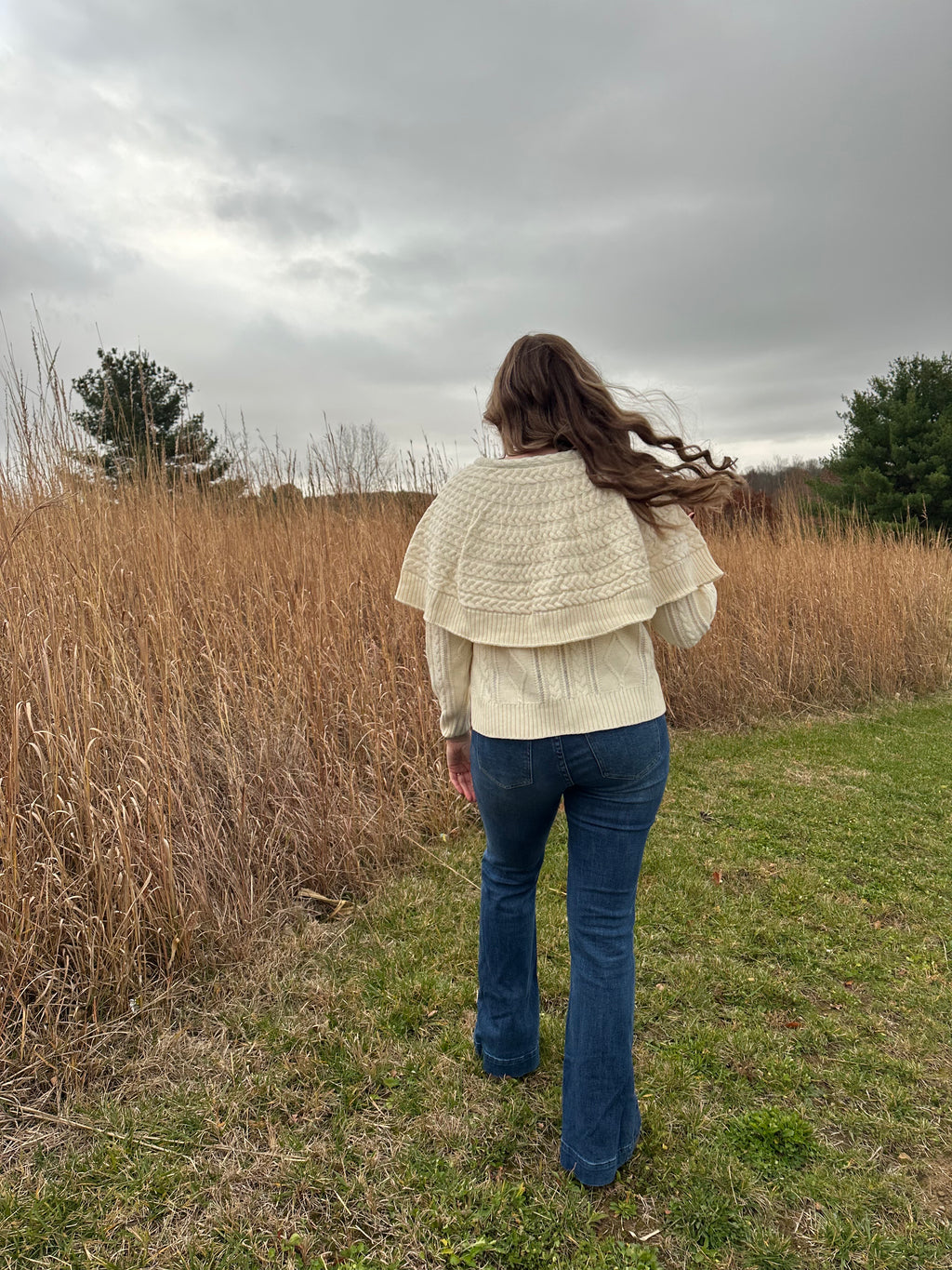 Cable knit cardigan with velvet black bow