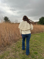 Cable knit cardigan with velvet black bow