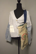 White knit cardigan with denim sleeve